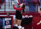 OHS Varsity Lady Cub #23 Aubree Englishbee sends a volley over the net against the Lady Mustang defenders. Photo by Will Sadler