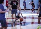 This little Cub may have been out of his league attending camp with older and bigger basketball players but there is no denying he was having the best time making memories and learning skills. Photo by Will Sadler