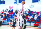 OHS Cub #15 Luke Lane continued a season of domination under the bucket against the Wildcats and came away with 7 points. Photo by Will Sadler