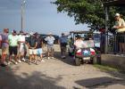 Olney Recreation Association President Landon Rowe (right) gathers golfers of the CEMCO Invitational to go over rules and assign holes for the tourney. Mr. Rowe has been a huge advocate and is a major factor in the revitalization of the Olney Country Club