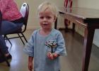 Auggie Bernhardt makes at Tree of Life at St. Luke Lutheran Church’s Family Night on June 18 at the Fellowship Hall. Photo by Gina Keating