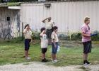 Olney American Legion Post 414 had the help of the Olney Cub Scout Troop 414 for their annual flag retirement ceremony on Sunday, the conclusion of National Flag Week. Participants salute as “To The Color” was played, as the flags were retired to the 