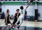 Bobcat #3 Keyton Newland makes layups with flare and grace on the boards against the Greyhounds. Photo by Will Sadler