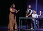 Miss Honey played by Stormie Harris [L] performs a scene with Matilda played by Jesse Branum [R]. Miss Honey was Matilda’s teacher and soon to be caregiver in the Matilda play. Photo by Will Sadler