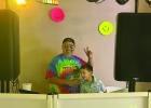 DJ Chris Widner spun the tunes at the Senior Cub Center dance, helped by his son. Photo by Candy Blair