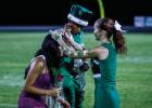 NHS Cheerleader Kourtney Whitfield Crowns the HOCO Queen and Hero. Photo by Will Sadler