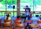 Storyteller Ms. Maria engages with children attending OCLAC’s last summer storytime event. Photo by Will Sadler