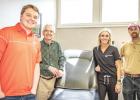 Archer Family Clinic receives exam table donation