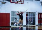 Lady Cub #4 Taylor Cadotte goes up for a powerful serve during the Lady Pirates match. | Photo by Will Sadler