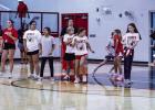 Little Sisters help their Big Sister counterparts during warm-up for the Perrin-Whitt match. Younger girls are paired with older Lady Cubs for mentorship and fun. | Photo by Will Sadler