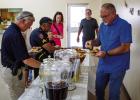 Chief Dan Birbeck speaks with peers during his going away luncheon. Photo by Will Sadler