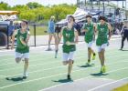 NHS Bobcat Relay Team Leighton Gowens, Ryder Ebert, Hudson Hill, and Joey Soito moving on in the 4x1 and 4x2 relay. Photo by Will Sadler