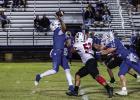 Cub defender #52 Jacobi Esquivel pressures the Bulldog QB hoping for a mistake downfield. Photo by Will Sadler