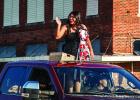 OHS Homecoming Queen nominees Allison Alvarado waves to parade attendees. Photo by Will Sadler