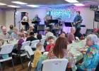 The FIrst Baptist Church of Olney drew a full house to its annual Fish Fry & Opry on Saturday, April 18. Attendees dined on all-you-can-eat fish plates and listened to Pastor Chad Edgington and his band jam. Photo by Gina Keating
