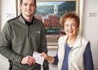 Larimore hands art show proceeds to KOB