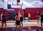 A Cub launches a floater that hits the bucket during Cub open gym night. Photo by Will Sadler