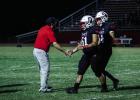 Olney Head Coach Dustin Altmiller congratulates players after the Cubs’ homecoming victory against the Crosbyton Chiefs. Photo by Will Sadler