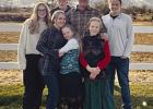 L-R: (Front row) Sarah 19,Rebecca, Avery 11, Rylee 12.Back row: Jake 22, Andy, and Marshall 24. Photo provided by Andy Wolfe
