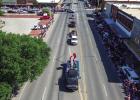 With reportedly over a 1,000 parade attendees it called for a new strategy for parade participants to make their way around the square, but Graham pulled it off without a hitch. Photo by Will Sadler