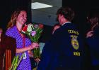 OHS FFA Ag Teacher Haylee Haralson received flowers and a special video presentation marking the end of her journey in the FFA and moving on to become the principal for Olney High School beginning next school year. Photo by Will Sadler