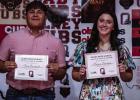 Ricco Sandoval (L) and Morgan Simmons (R) show off their Charlie Davis Awards at the OHS Athletic Banquet. Photo by Will Sadler
