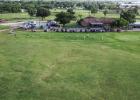 Golfers in the CEMCO Invitational begin the tourney with warming up at the driving and putting green. Photo by Will Sadler