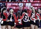 The Lady Cubs huddle for last-minute instructions from OHS Volleyball Coach Nicholas Tarr. Photo by Will Sadler