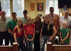 4Hers made a presentation to Young County Commissioners on Oct. 14 to mark National 4H Week. (L-R): Commissioner Alan Craig, Commissioner Jimmy Wiley, Kutter Gough, Ella Buse, Colt Crago, Lexi Gowens, True Creel, Addison Greenwood, Judge Win Graham, Peyto