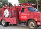 Olney’s Lady Cubs Volleyball players catch a ride on an Olney Volunteer Fire Department truck to the Sept. 16 Homecoming pep rally at Cub Stadium. Photo by Kailyn Altmiller