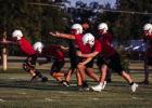Cub offensive linemen practice techniques that will later become second nature during upcoming scrimmages and games. Photo by Will Sadler
