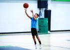 By the smiles and laughter, it looked like shooting the ball was everyone’s favorite part of summer basketball camp. Photo by Will Sadler