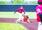 OHS Cub second baseman #3 Ryder Lisle dashes for the grounder as a Pirate slide for second. Photo by Will Sadler