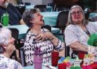 Edwana Fikes, a longtime volunteer at the Olney Senior Cub Center, reacts to thanks by Center director Angela Lockard, who lauded Mrs. Fikes for her long service to the Senior Cub Center. Mrs. Fikes announced her retirement in July. Photo by Will Sadler