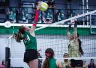 Ladycat #24 Sophie Terrell spikes a kill shot past a Lady Pirate defender. Photo by Will Sadler