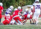 The Cub defense kept the Plowboys quarterback scrambling the whole game and attacked the ball carrier as one unit! Photo by Will Sadler