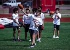 Football camp teaches many skills like passing while instilling competitive spirit with awards for each station for the top performers. Photo by Will Sadler