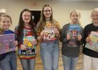 Sixth-grader raises money, buys books for Toys for Tots