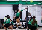 (BOTTOM LEFT): NHS Ladycat #11 Emma Hawkins sends a kill shot to the Lady Mavericks. Photo by Will Sadler
