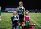 Crown bearer: Casen Jackson and Flower girl: Lottie Hardin with NHS Cheerleader Kourtney Whitfield. Photo by Will Sadler