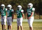 The NJH Bobcat Captains greet the May Tigers mid-field to shake hands and perform the coin toss. Photo by Will Sadler