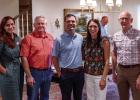 Julie Nawrocki, director of philanthropy for the Wichita Falls Area Food Bank, stands with United Methodist Pastor Harrell Braddock, Olney Mayor Rue Rogers, Anna Rogers, and Food Bank CEO David O’Neil at a reception to inform Olney residents about the F