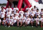 Attendees of the Kindergarten through 5th grade Cub football camp pose for a team photo. The camp for the younger athletes previews two-a-day workouts for Olney High School athletes, whose season begins in earnest in August. Photo by Will Sadler
