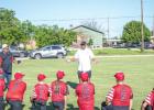 Retired baseball pro encourages the Olney Cub Little League team