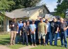 The HOME team: The Olney Police Department and the House of Mercy Enterprises (HOME) teamed up to clean up a house on West Payne as part of a code enforcement push. Photo by Gina Keating
