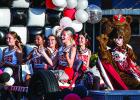 OHS Homecoming Queen nominee Rae Bond rides in style during the HOCO parade atop a 1960’s era Cub red Cobra. Photo by Will Sadler