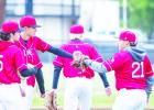 OHS Cub pitcher #11 Tucker Cortinez dabs gloves short stop #21 Ricco Sandoval at the mound before game play. Photo by Will Sadler
