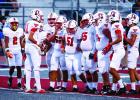 Cub #11 Tucker Cortinez QB-SS talks to teammates before going to the line. Cortinez has gained more confidence with each game, spreading out passes to several receivers and scrambling out of the pocket to pick up yards when needed to keep drives alive. Ph