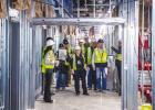 Community members tour the new Olney Hamilton Hospital, which is expected to be completed in October. Photo by Will Sadler