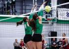 NHS Ladycats #24 Sophie Terrell [L] and #1 Camren Mallory form a dynamic blocking wall to stop a Lady Mavericks shot. Photo by Will Sadler